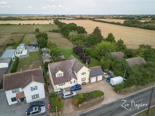 *** 1.24 ACRES *** An outstanding five-bedroom family home with  established grounds, a stable block and detached guest accommodation.